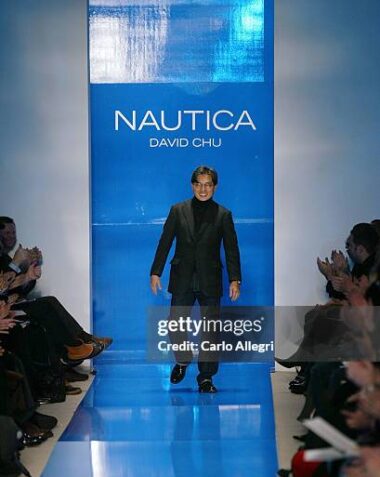 NEW YORK - FEBRUARY 6:  Designer David Chu walks the runway at the Nautica fashion show during Olympus Fashion Week at Bryant Park February 6, 2004 in New York City.  (Photo by Carlo Allegri/Getty Images for Olympus Fashion Week)